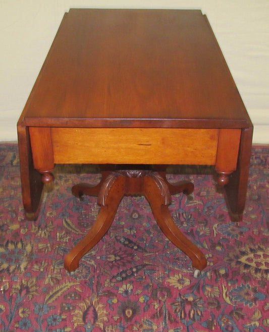 SHERATON NEW ENGLAND CHERRY DROPLEAF BREAKFAST TABLE WITH RARE CARVED BASE