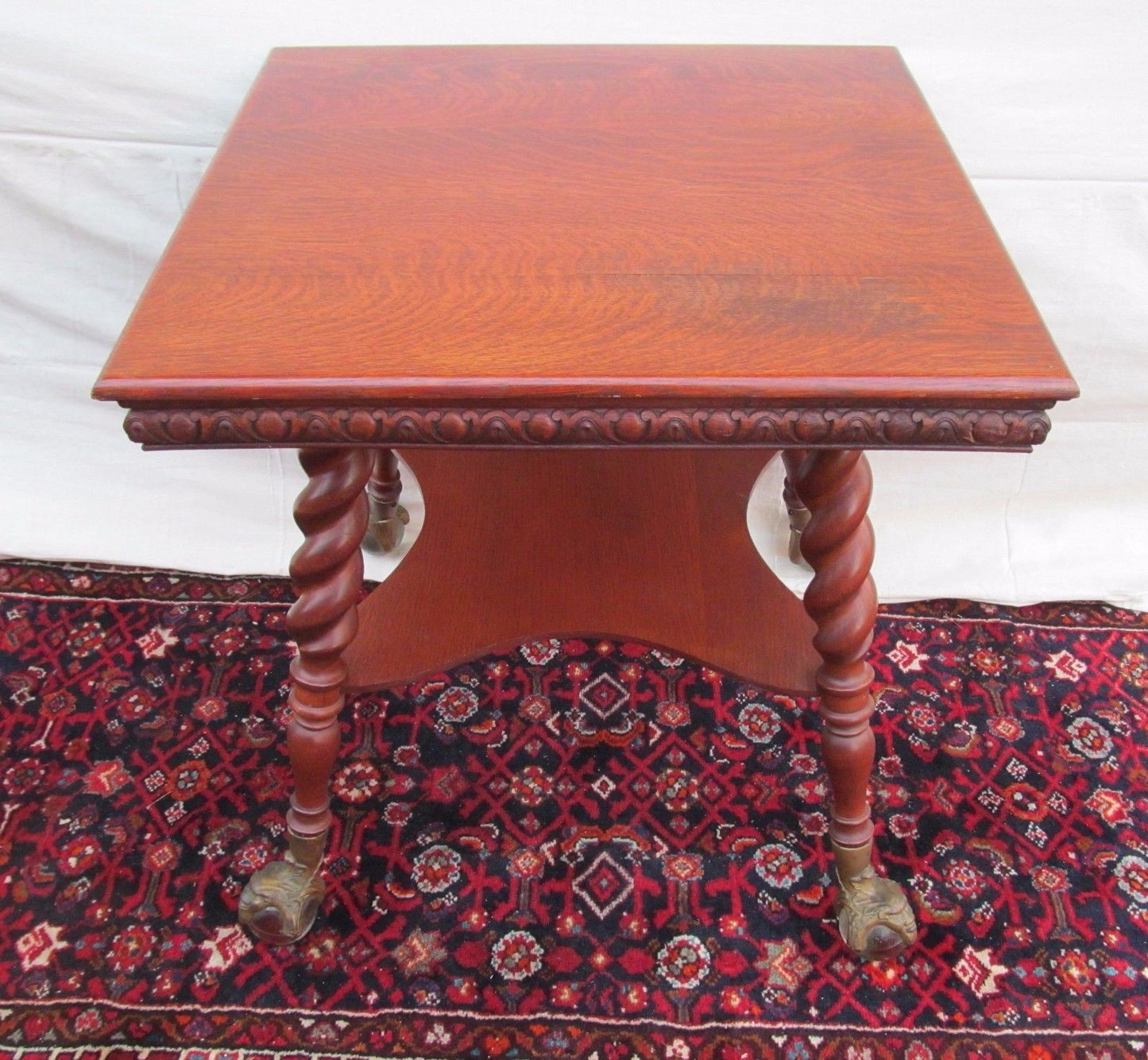 VICTORIAN TIGER OAK PARLOR TABLE WITH GLASS BALL & CAST IRON GROTESQUE HEAD FEET