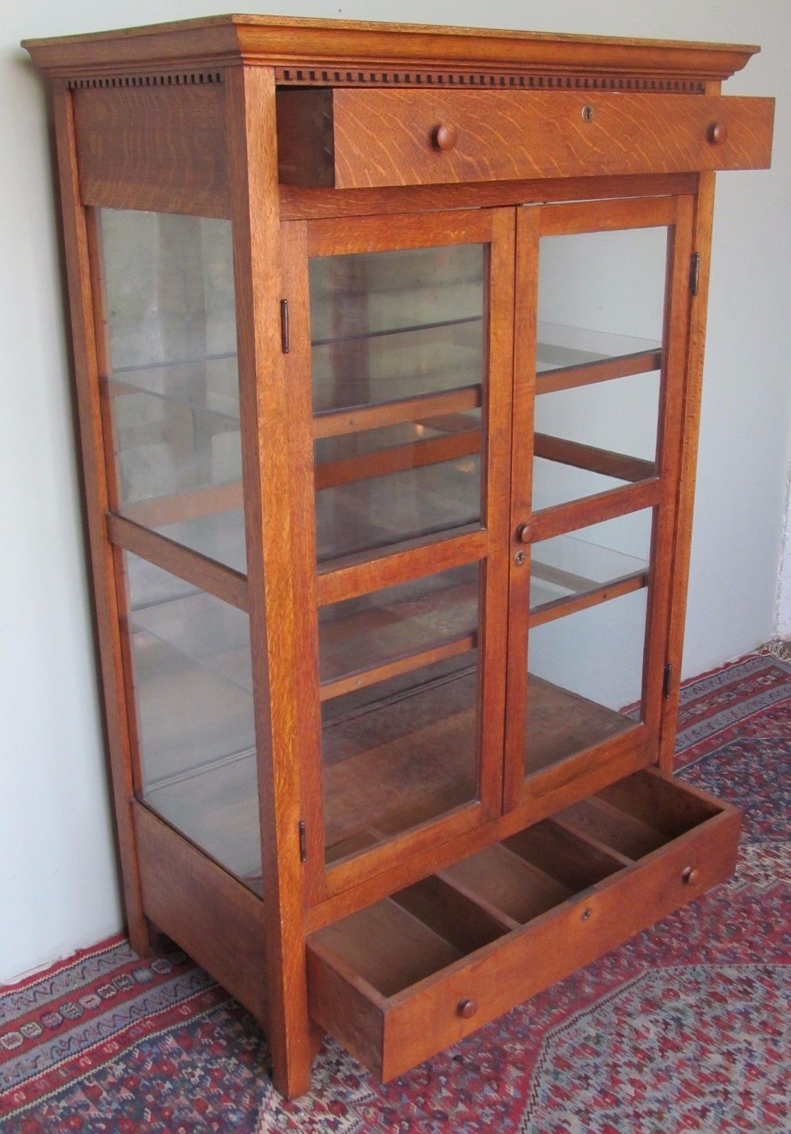 VICTORIAN OAK KITCHEN CABINET WITH CARVED DENTAL WORK MOLDING