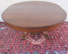 Load image into Gallery viewer, EXTRA CHOICE VICTORIAN TIGER OAK DINING TABLE WITH LION PAW BASE BY LARKIN
