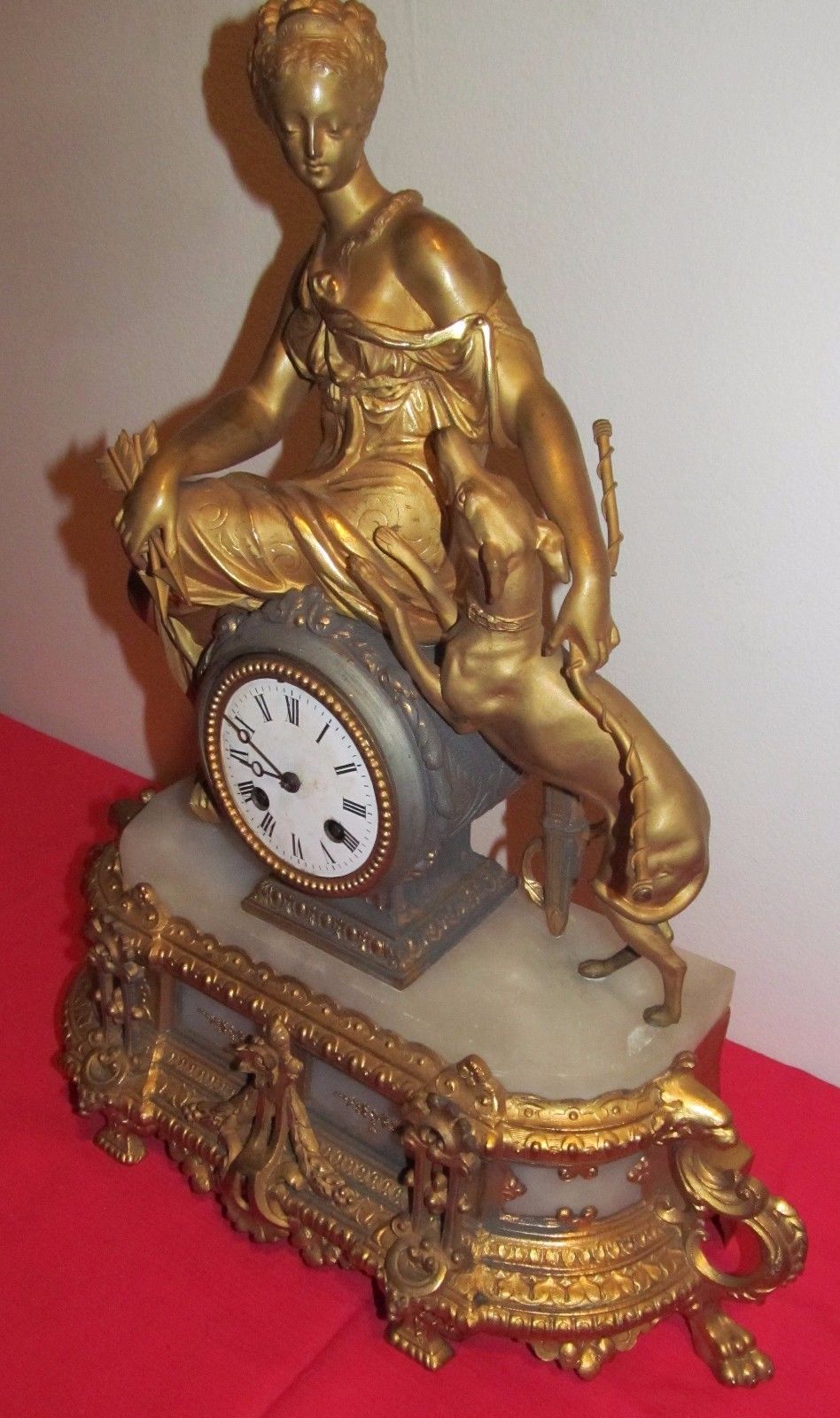 ANTIQUE HIGHLY GOLD GILT FRENCH CLOCK DEPICTING MAIDEN WITH WHIPPET - GLASS DOME