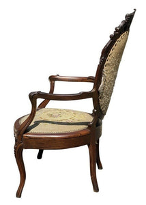 19TH C ANTIQUE VICTORIAN ARMCHAIR W/ CARVED CREST & NEEDLEPOINT SEAT