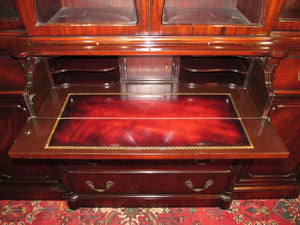 CHIPPENDALE STYLE MAHOGANY BUBBLE GLASS BREAKFRONT WITH BUTLER'S DESK