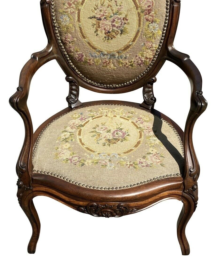 19TH C ANTIQUE VICTORIAN ARMCHAIR W/ CARVED CREST & NEEDLEPOINT SEAT