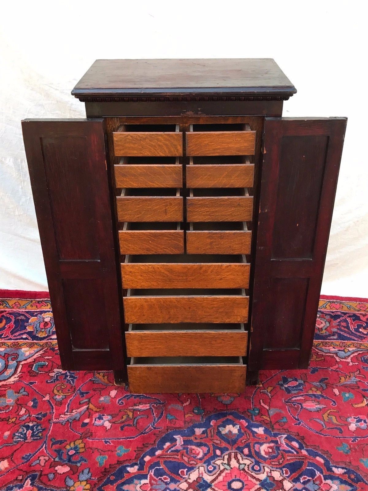 VICTORIAN RAISED PANEL OAK & PINE APOTHECARY CABINET WITH EGG & DART MOLDINGS