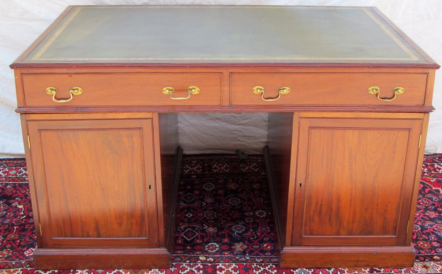 FINE GEORGIAN MAHOGANY CAMPAIGN DESK WITH LEATHER TOP AND PARTNER'S DESK FEATURE