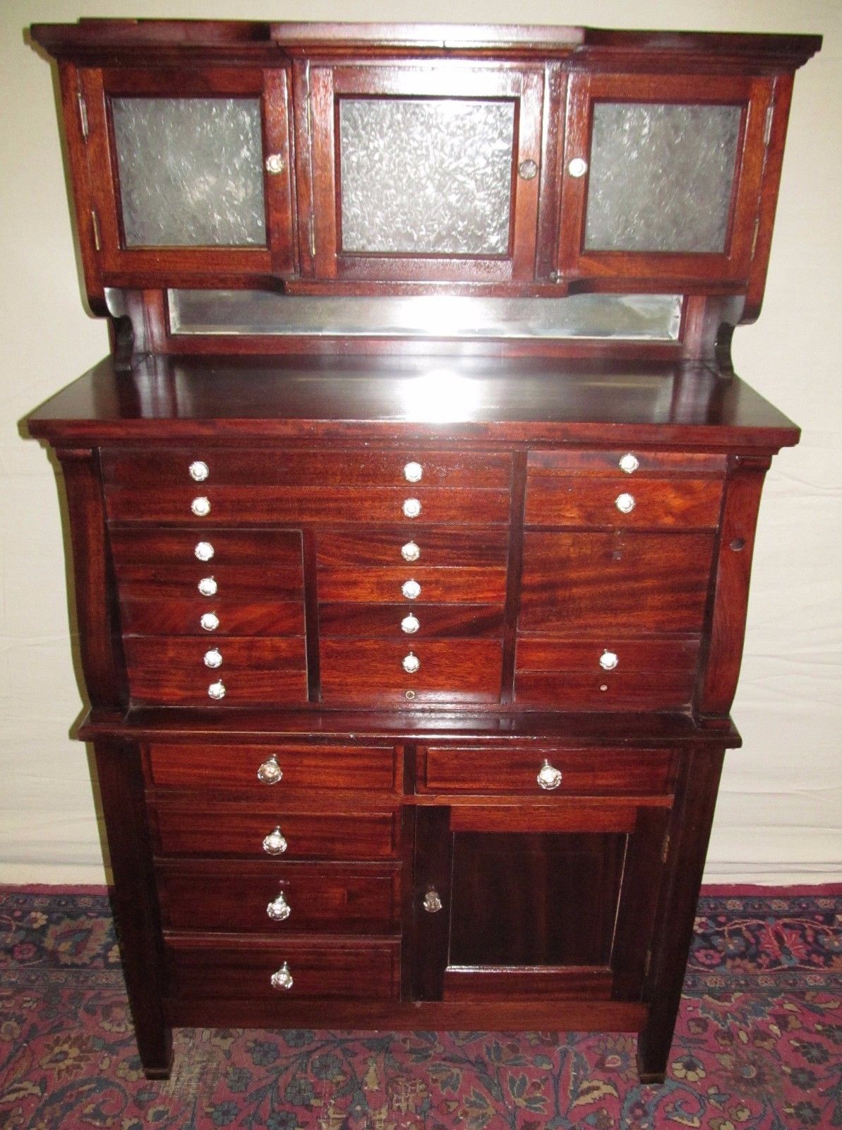 FINE 19TH CENTURY 20 DRAWER MAHOGANY DENTAL CABINET BY THE AMERICAN CABINET CO.