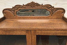 Load image into Gallery viewer, 19TH C. VICTORIAN GOLDEN OAK BOOKCASE WITH MIRRORED AND CARVED GALLERY.