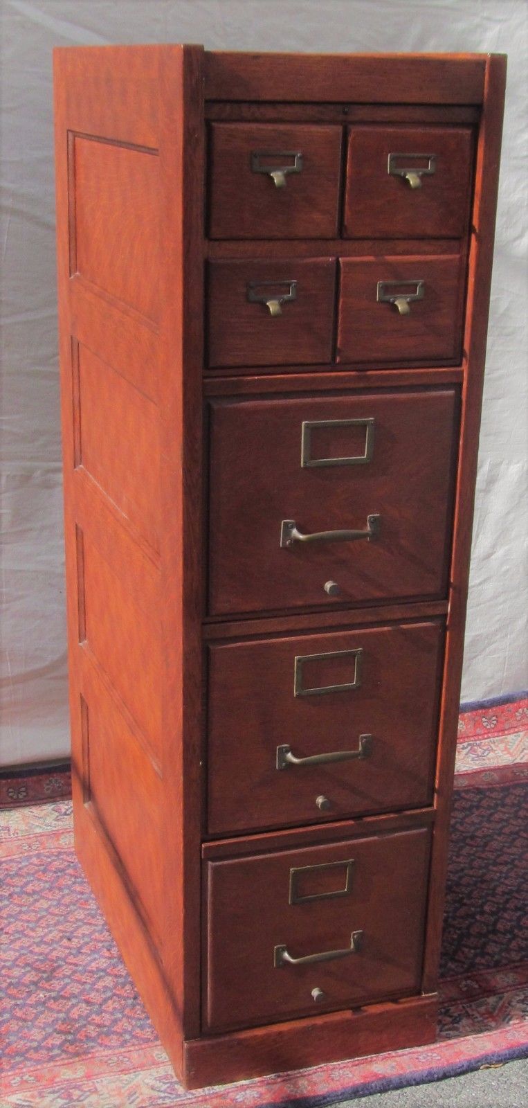 ANTIQUE ARTS & CRAFT OAK RAISED PANEL FILE CABINET WITH 4 OVER 3 DRAWER FORMAT