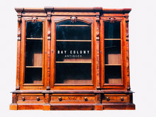 Load image into Gallery viewer, 19TH C ANTIQUE CARVED WALNUT VICTORIAN TRIPLE DOOR BOOKCASE BY THOMAS BROOKS