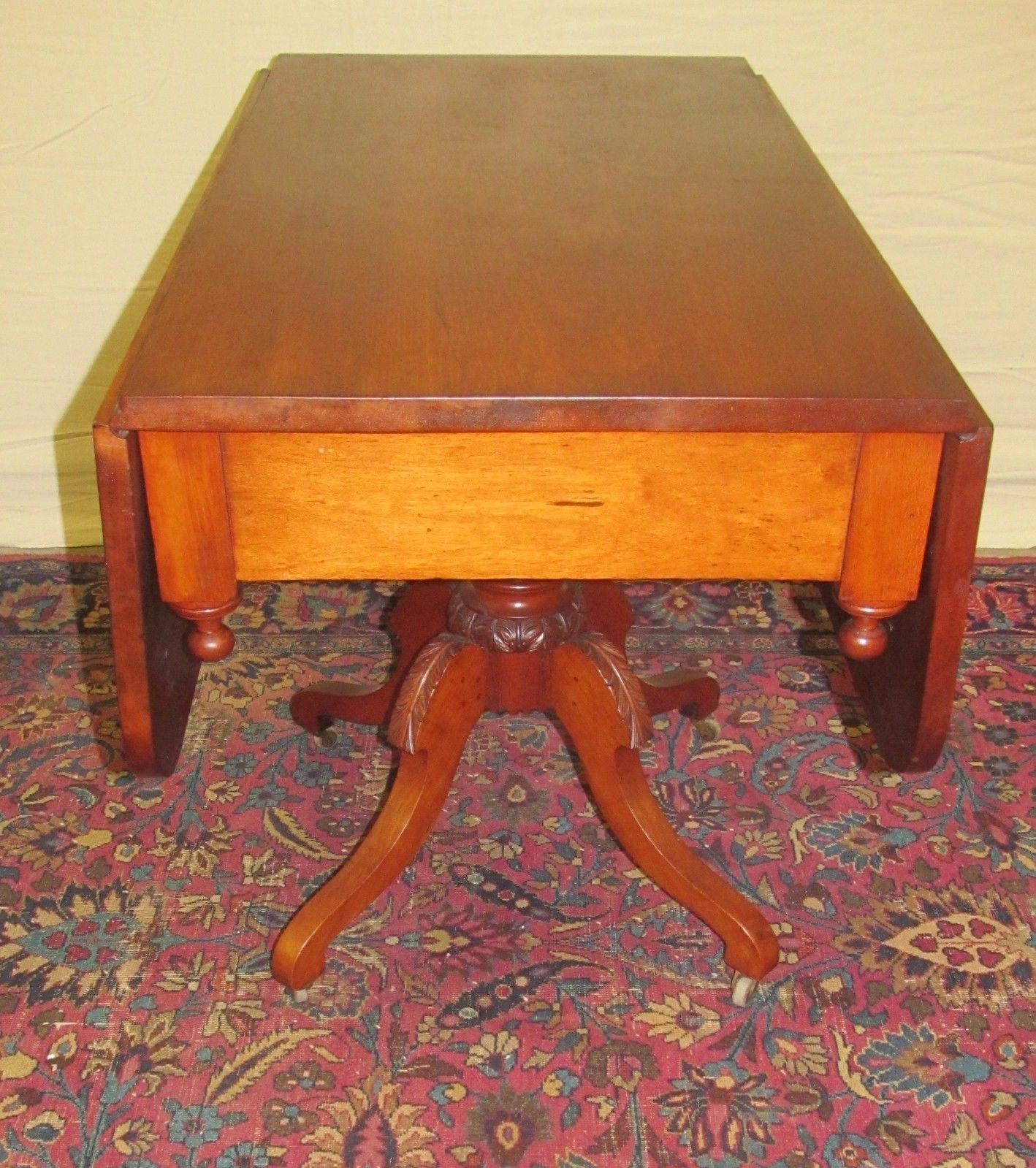 SHERATON NEW ENGLAND CHERRY DROPLEAF BREAKFAST TABLE WITH RARE CARVED BASE