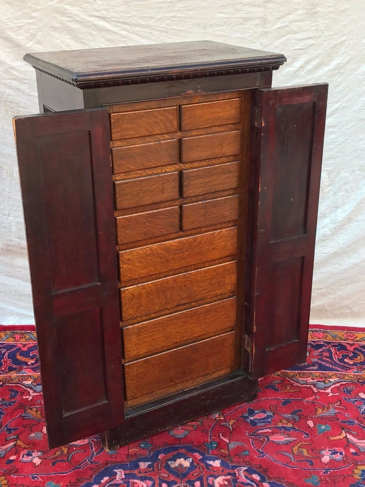 VICTORIAN RAISED PANEL OAK & PINE APOTHECARY CABINET WITH EGG & DART MOLDINGS