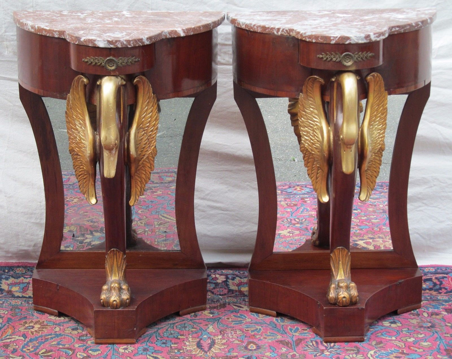 PAIR OF FRENCH NAPOLEONIC STYLED MARBLE TOP NIGHTSTANDS WITH GOLD FIGURAL SWANS