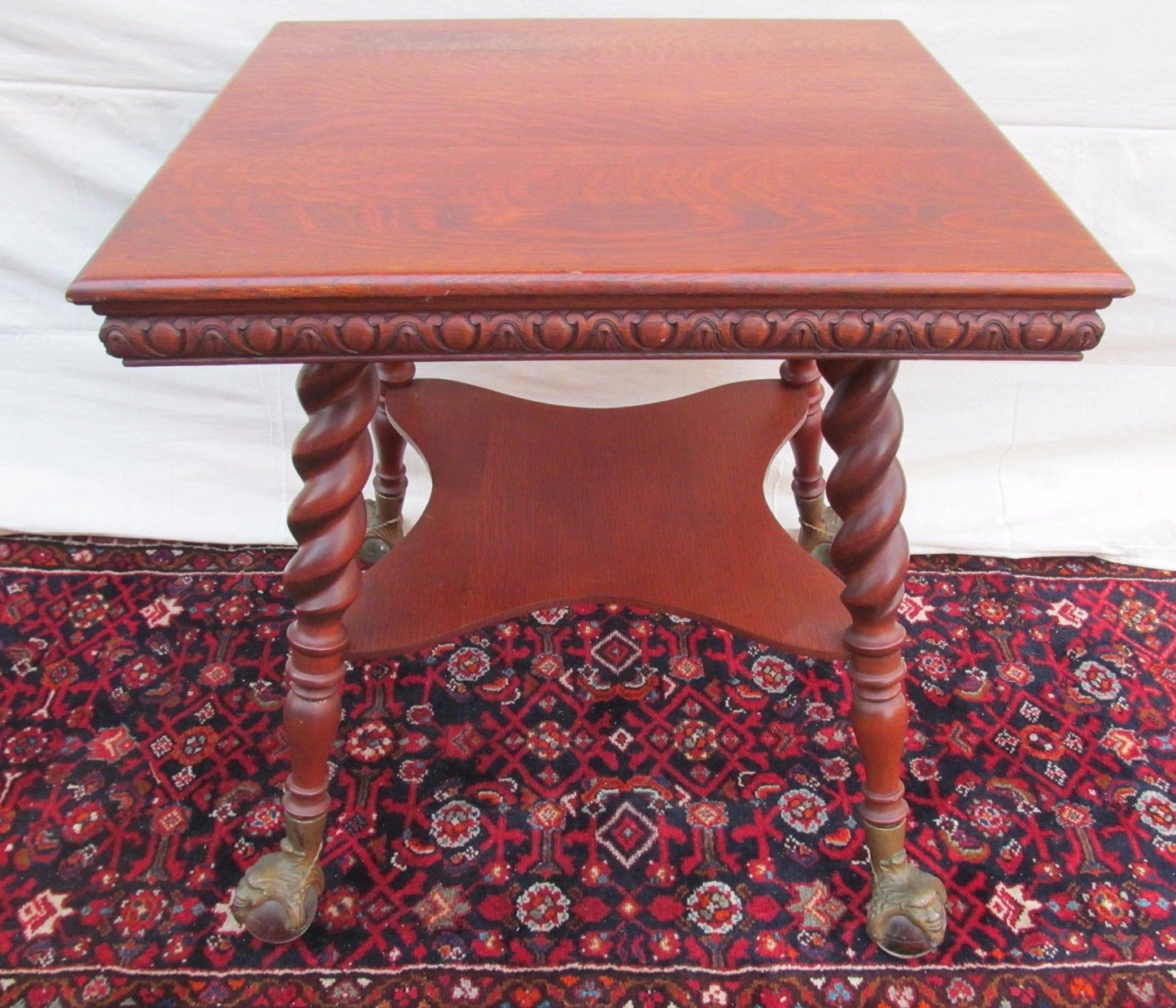 VICTORIAN TIGER OAK PARLOR TABLE WITH GLASS BALL & CAST IRON GROTESQUE HEAD FEET