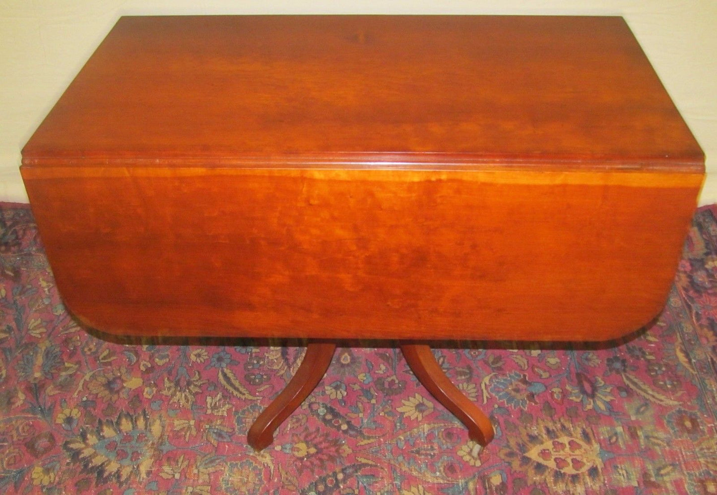 SHERATON NEW ENGLAND CHERRY DROPLEAF BREAKFAST TABLE WITH RARE CARVED BASE