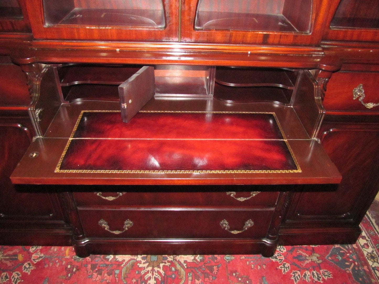 CHIPPENDALE STYLE MAHOGANY BUBBLE GLASS BREAKFRONT WITH BUTLER'S DESK