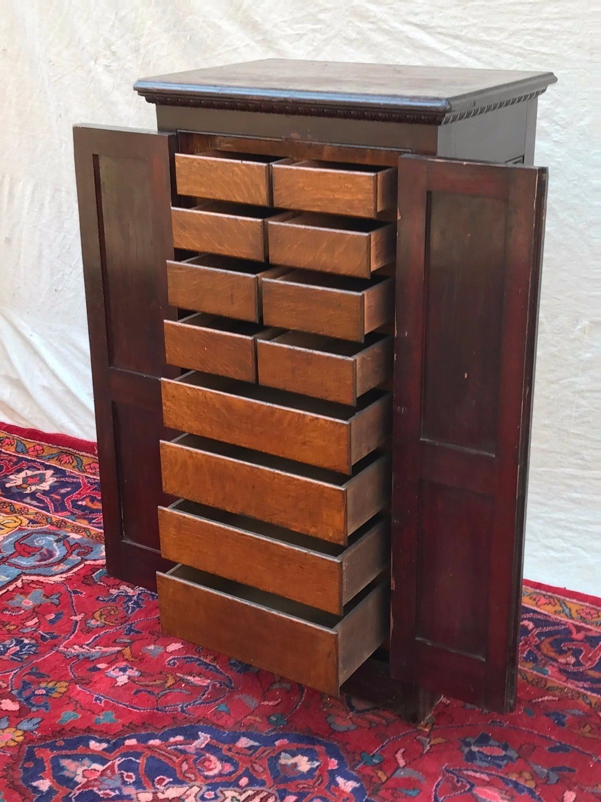 VICTORIAN RAISED PANEL OAK & PINE APOTHECARY CABINET WITH EGG & DART MOLDINGS