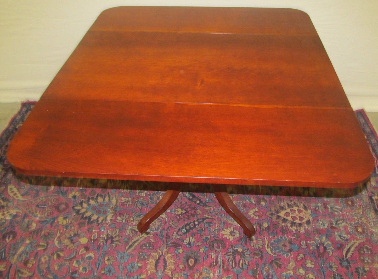 SHERATON NEW ENGLAND CHERRY DROPLEAF BREAKFAST TABLE WITH RARE CARVED BASE