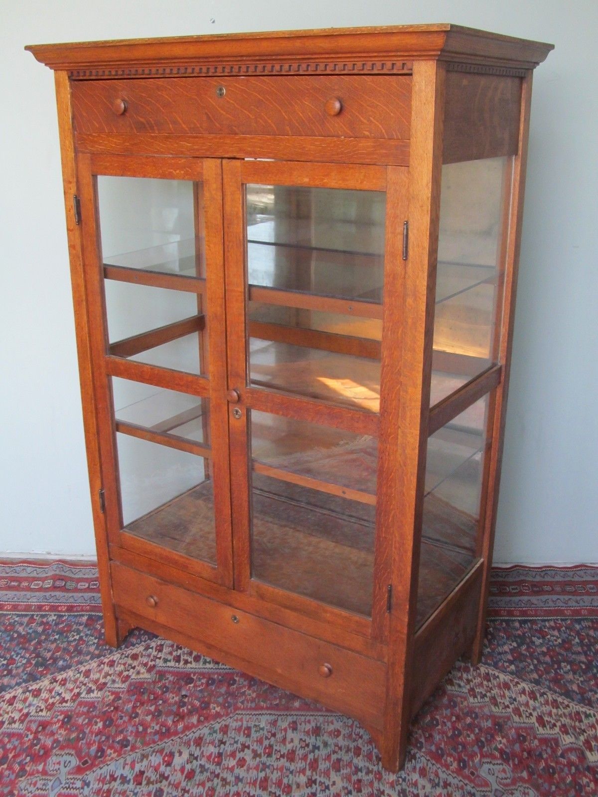 VICTORIAN OAK KITCHEN CABINET WITH CARVED DENTAL WORK MOLDING