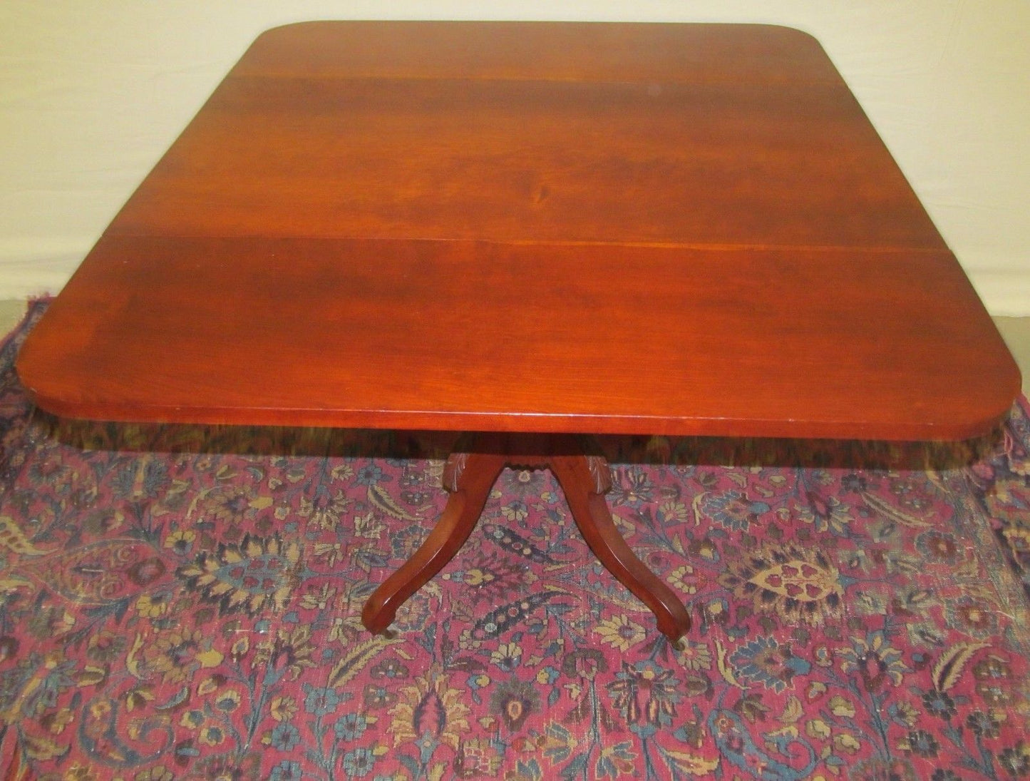 SHERATON NEW ENGLAND CHERRY DROPLEAF BREAKFAST TABLE WITH RARE CARVED BASE