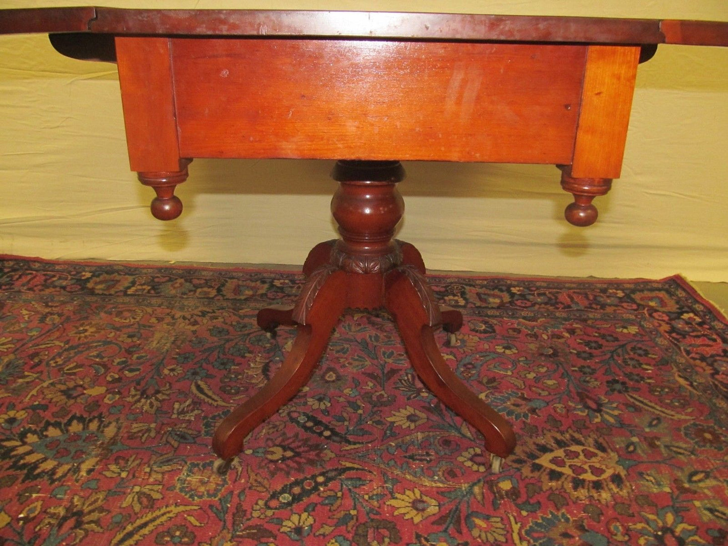 SHERATON NEW ENGLAND CHERRY DROPLEAF BREAKFAST TABLE WITH RARE CARVED BASE