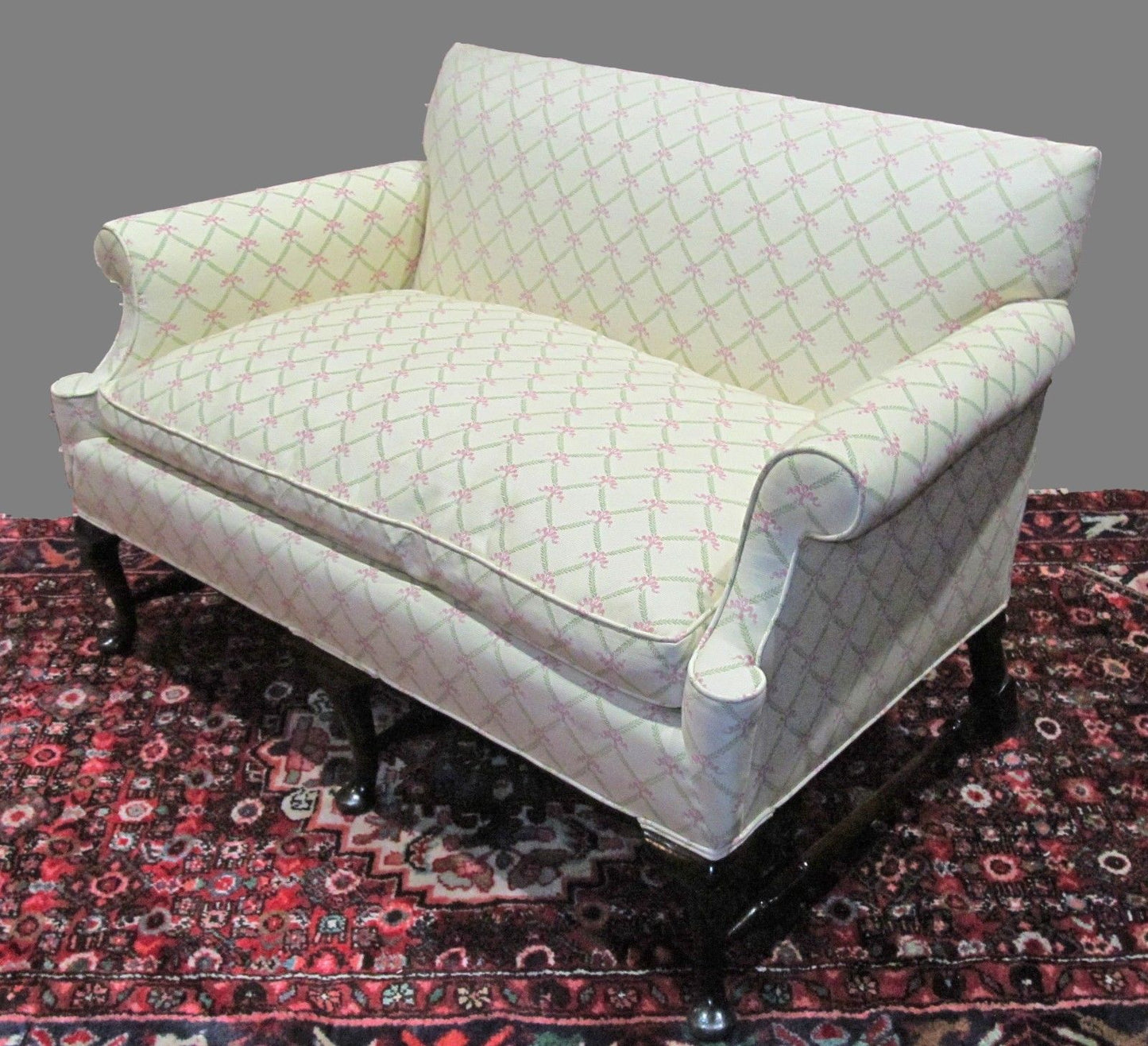 PAIR-QUEEN ANNE STYLED SETTEES ON FINELY FORMED STRETCHER BASES & PAD FEET