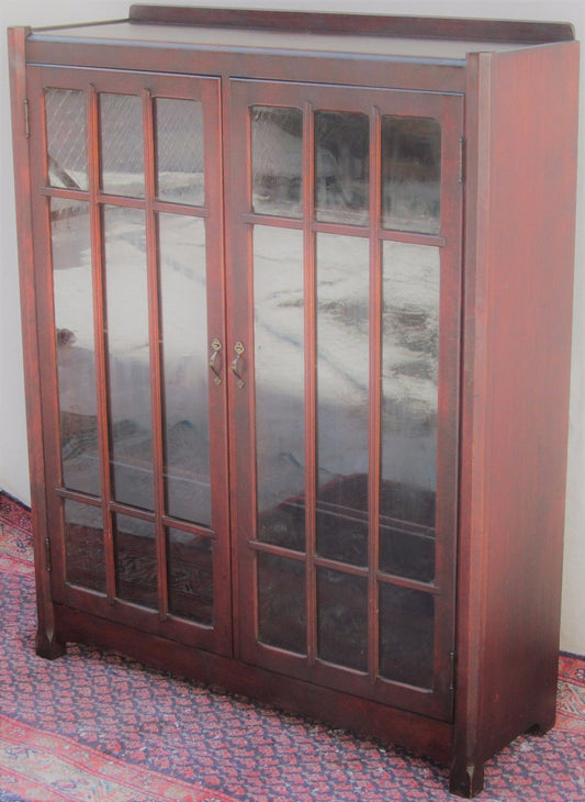 ARTS & CRAFTS DOUBLE GLASS DOOR BOOKCASE WITH LATTICE WORK DOORS