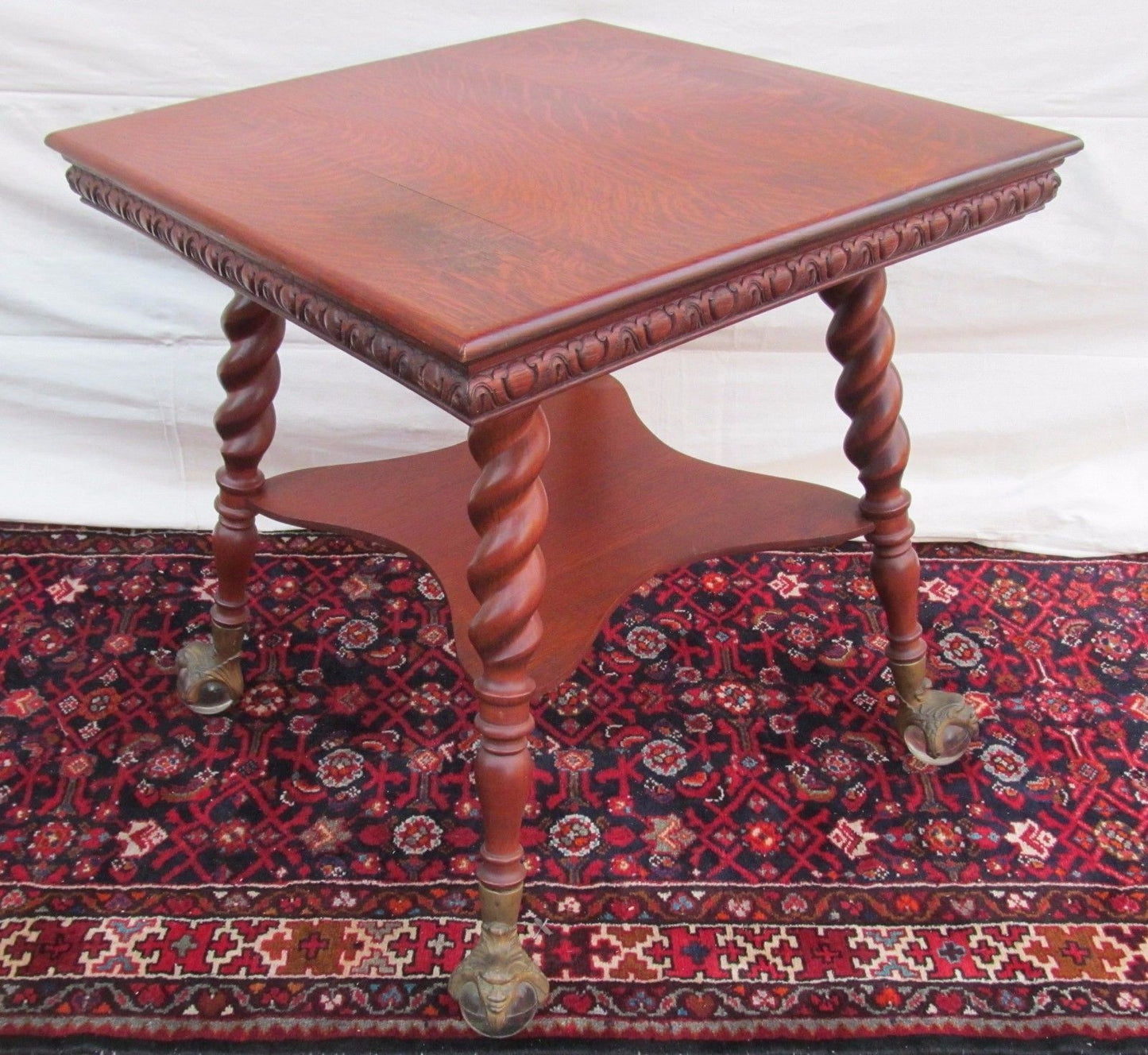 VICTORIAN TIGER OAK PARLOR TABLE WITH GLASS BALL & CAST IRON GROTESQUE HEAD FEET